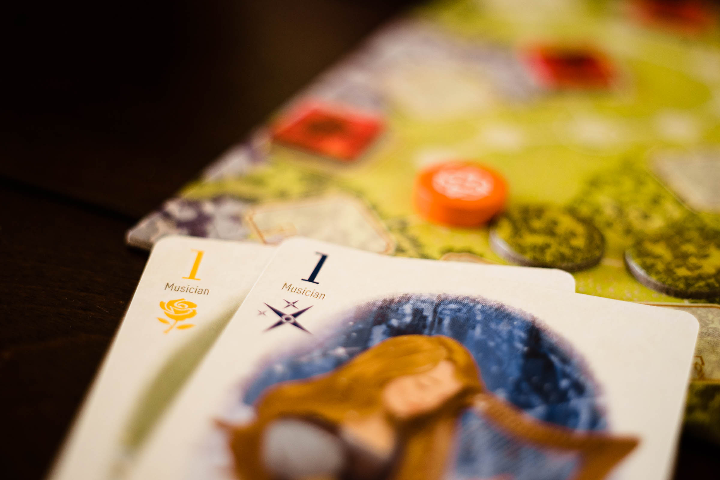Cards from Fox in the Forest Duet, layered atop a board.